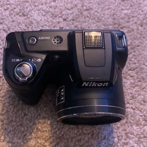 im selling a camera the brand is Nikon it is black